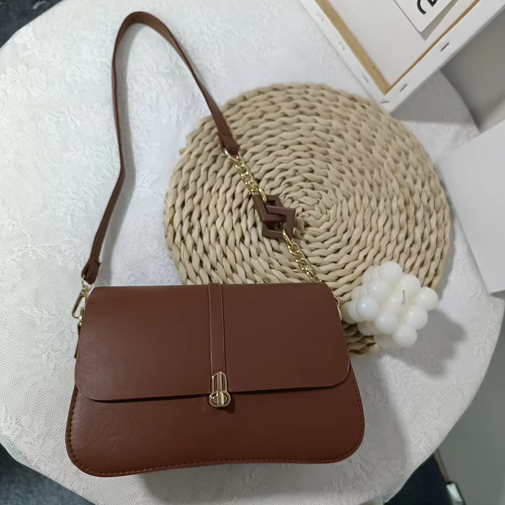 2025 summer new high-quality texture baguette bag fashionable light luxury chain underarm saddle bag versatile shoulder bag