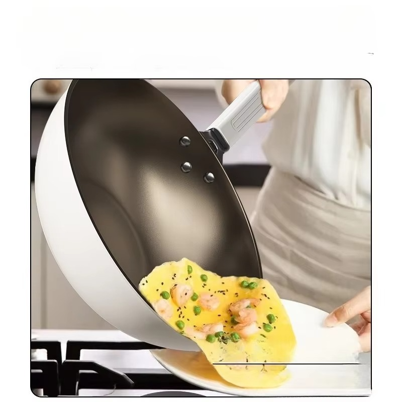 Titanium uncoated ceramic household flat bottomed stir fry pan, non stick to gas electromagnetic stove special