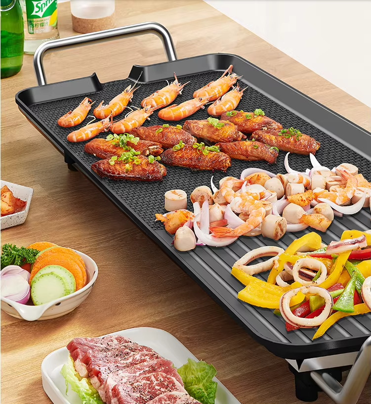 220V electric grill with nonstick flat plate for fast, smoke-free indoor grilling and frying. Compact, energy-efficient, and perfect for everyday kitchen use.