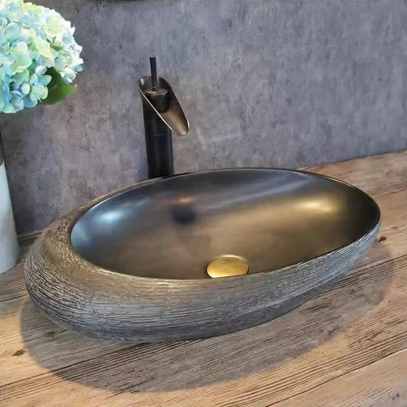 Artistic washbasin; oval wash basin; single basin for home use; bathroom wash basin; vintage ceramic wash basin.