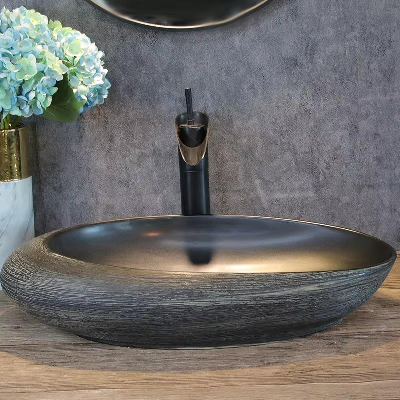 Artistic washbasin; oval wash basin; single basin for home use; bathroom wash basin; vintage ceramic wash basin.