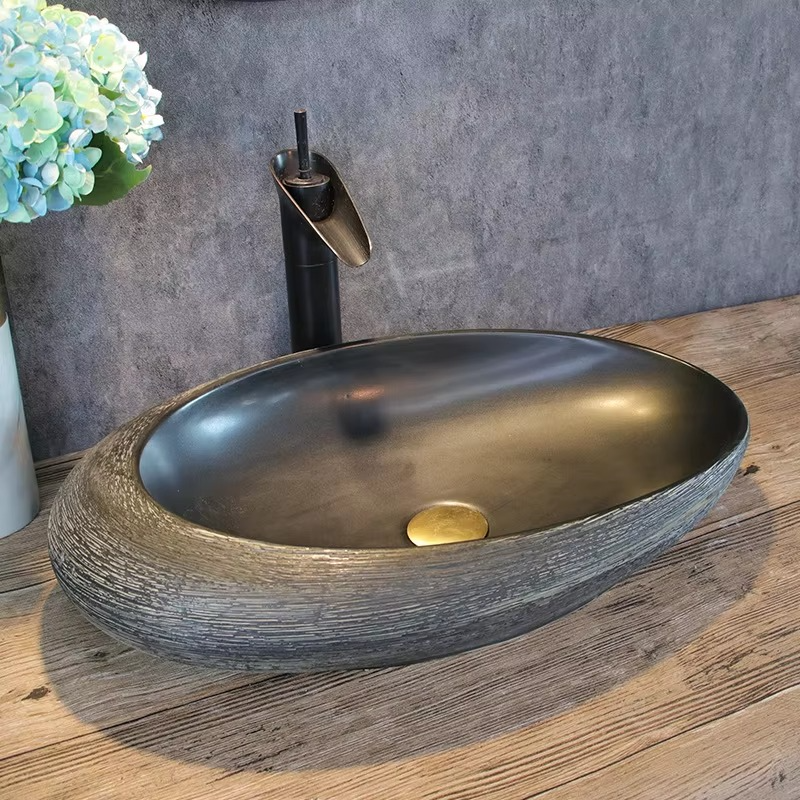 Artistic washbasin; oval wash basin; single basin for home use; bathroom wash basin; vintage ceramic wash basin.