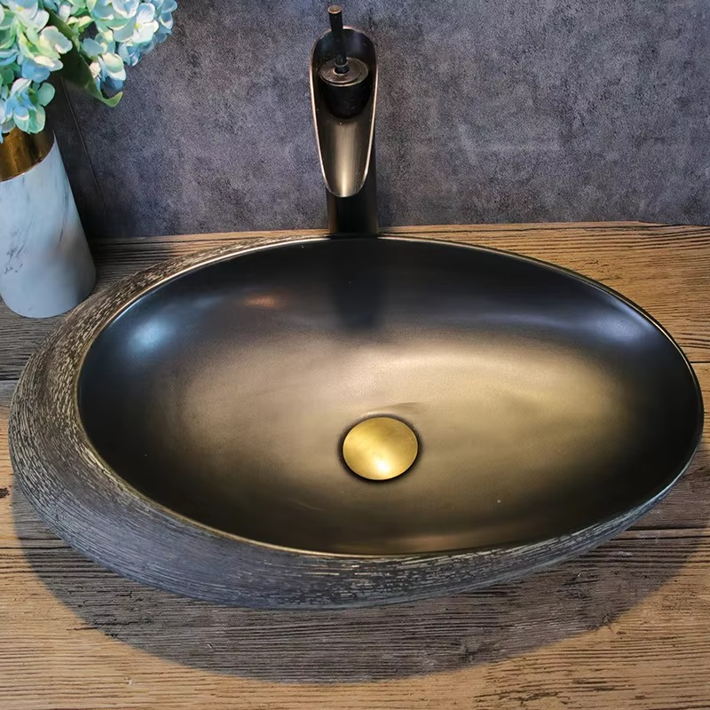 Artistic washbasin; oval wash basin; single basin for home use; bathroom wash basin; vintage ceramic wash basin.