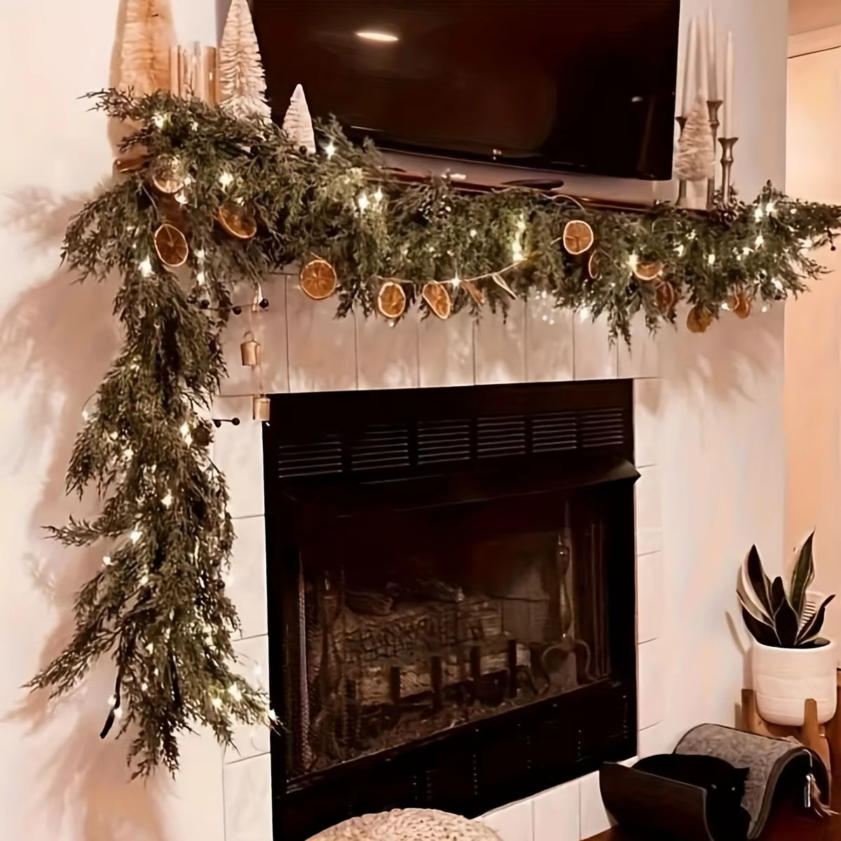A man-made cedar wreath - versatile Christmas and winter wedding decoration